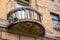 Old ruined balcony with rope and clothespins. Rostov-on-Don, Russia