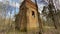 Old ruined brick water tower in the forest