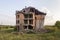 Old ruined building after earthquake. A collapsed brick house