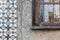 Old ruined domestic house facade building with typical tiled facade wall in Porto, Portugal