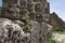 Old Ruined Farmstead and Stone Walls. Decorated part of the wall of the temple in Kutaisi