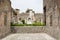 Old ruined stones of Italian Roman Pompei houses streets