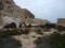 Old ruined sulfur mine in the mountains. Old factory. Greece. Milos island