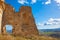 Old ruined wall against the blue sky in Craco, Italy