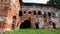 Old ruins of a medieval abandoned ruined red brick castle or Orthodox temple