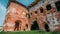 Old ruins of a medieval abandoned ruined red brick castle or Orthodox temple