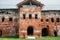 Old ruins of a medieval abandoned ruined red brick castle or Orthodox temple