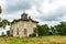 Old rundown house in a field