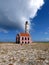 Old rundown lighthouse at Small Curacaco