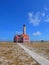 Old rundown lighthouse at Small Curacao, Caribbean