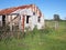 Old rural farm shed and life stock loading ramp at a rural setting in the late afternoon sun