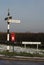 Old rural road sign, with postbox