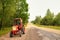 Old Russian tractor on gravel road