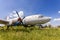 Old russian turboprop aircraft Il-14M at an abandoned aerodrome