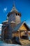 The old Russian wooden Church consisted of several tiers with a cross at the top. Museum of wooden architecture