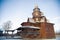 The old Russian wooden Church consisted of several tiers with a cross at the top. Museum of wooden architecture