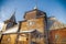 The old Russian wooden Church consisted of several tiers with a cross at the top. Museum of wooden architecture