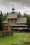 Old Russian wooden house church in the forest