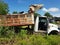 An old rusted and dismantled truck