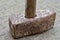 Old rusted hammer with handle