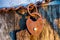 Old rusted heart shaped padlock on a loop chain