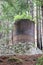 Old, rusted lime kilns are eerie, abandoned structures on the trail at Limekiln State Park, Big Sur, CA.