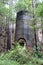 Old, rusted lime kilns are eerie, abandoned structures on the trail at Limekiln State Park, Big Sur, CA.