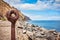 Old rusted piece of guard rail on a quay