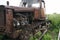 Old rusted rural farm tractor