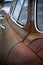 Old Rusted Vintage Automobile with peeling paint windows and door handle