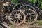 Old and rusted wagon wheels in the park, Tbilisi, Georgia.