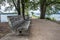 Old rustic benches at the lake