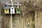 Old rustic birdhouses on fence