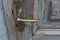 Old rustic brass door handle.