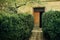 Old rustic building with wooden doors and geen garden, italian p