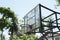Old rustic grunge basketball hoop in wild tropical forest environment