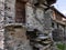 Old rustic house with wooden door in Frasco, Ticino