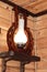 Old rustic lamp on a wooden background