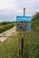 Old rustic sign in countryside