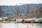 Old rustic and vintage wooden boats laying on land in port