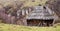 An old rustic wooden cottage inhabited by the shepherds during the summer in the Carpathians, Fundatura Ponorului