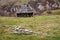 An old rustic wooden cottage inhabited by the shepherds during the summer in the Carpathians, Fundatura Ponorului