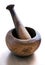 Old rustic wooden pestle and mortar