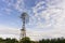 The old rusting steel windmill is a machine for producing continuous power from wind and air, in which a wheel fitted with steel