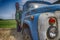 Old rusting truck or lorry outdoors in a field