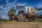 Old rusting truck or lorry outdoors in a field