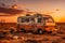 old rusty abandoned bus stands in the desert. Beautiful view of red sunset