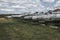 Old rusty abandoned planes stand on the grass under the open sky. Vintage military aircraft.