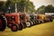 Old and rusty agricultural tractors lined up