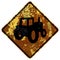 Old rusty American road sign - Alternative Tractor farm vehicle crossing sign